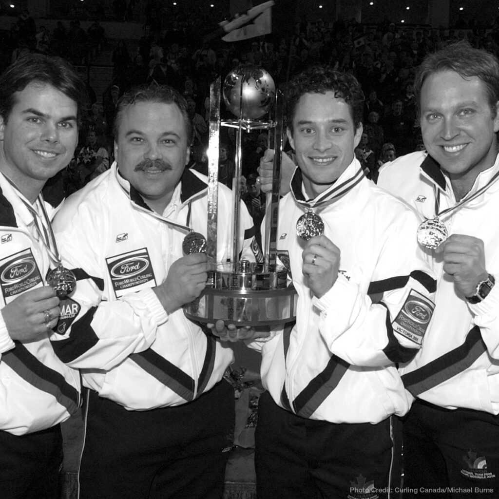 The Ferbey Four, featured image, seen posing with their championship trophy