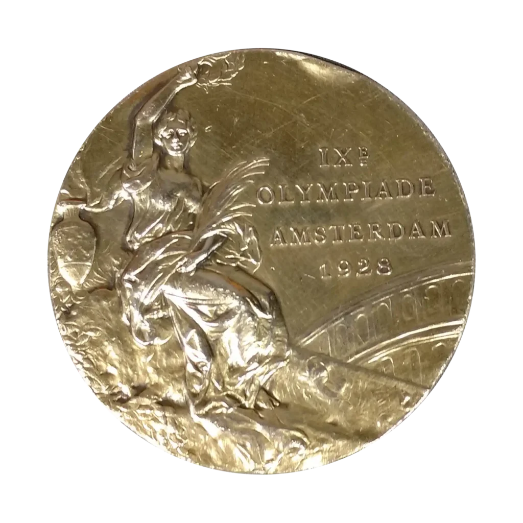 The backside of Myrtle Cook’s Gold Medal from the 1928 Olympic Games held in Amsterdam. The medal reads, "IX Olympiade Amsterdam 1928."