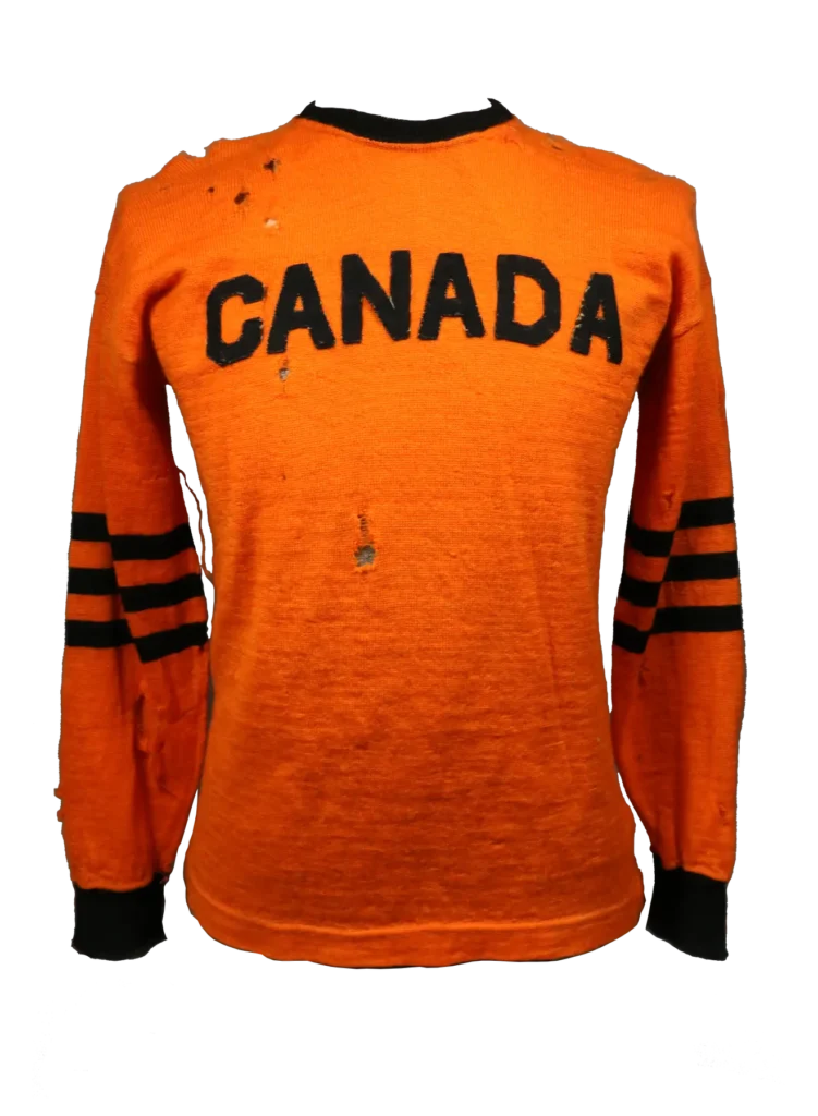 An orange jersey. "Canada" is written across the chest.